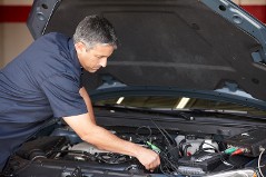 Man Repairing Car